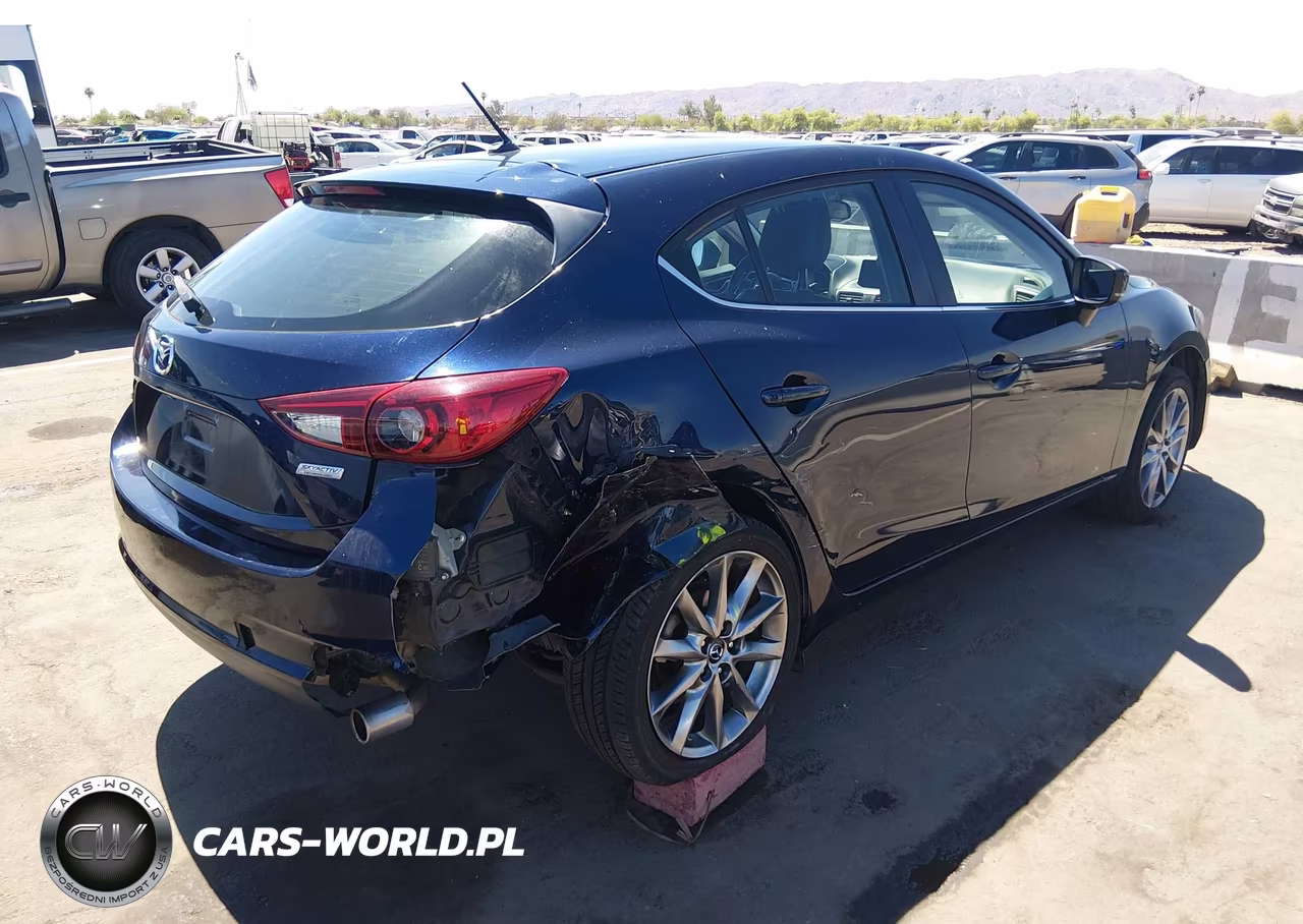 2018 Mazda Mazda3 Touring VIN:3MZBN1L31JM204615 - 6