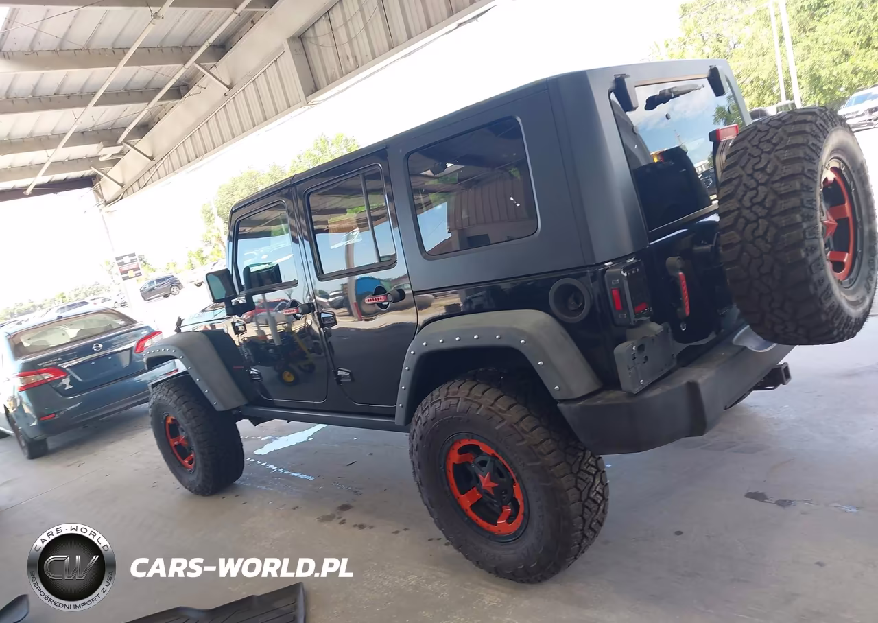 2008 Jeep Wrangler Unlimited Rubicon VIN:1J4GA69138L631808 - 14