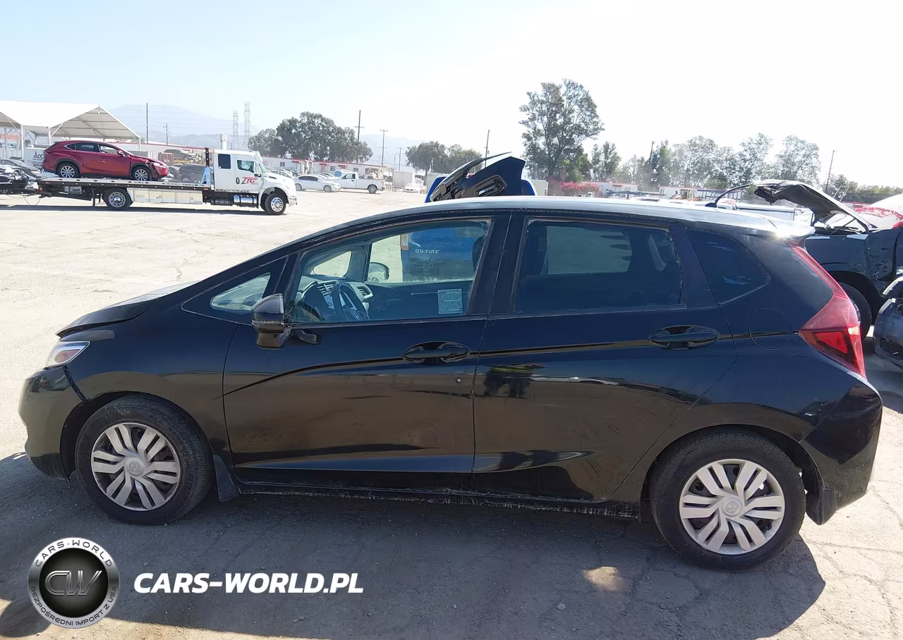 2015 Honda Fit Lx VIN:3HGGK5G54FM719671 - 14