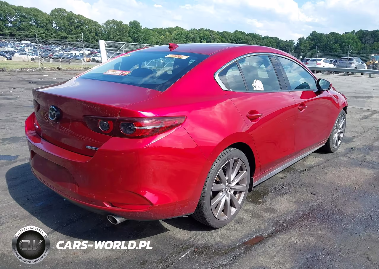 2019 Mazda Mazda3 Premium Package VIN:3MZBPAEM9KM100682 - 4