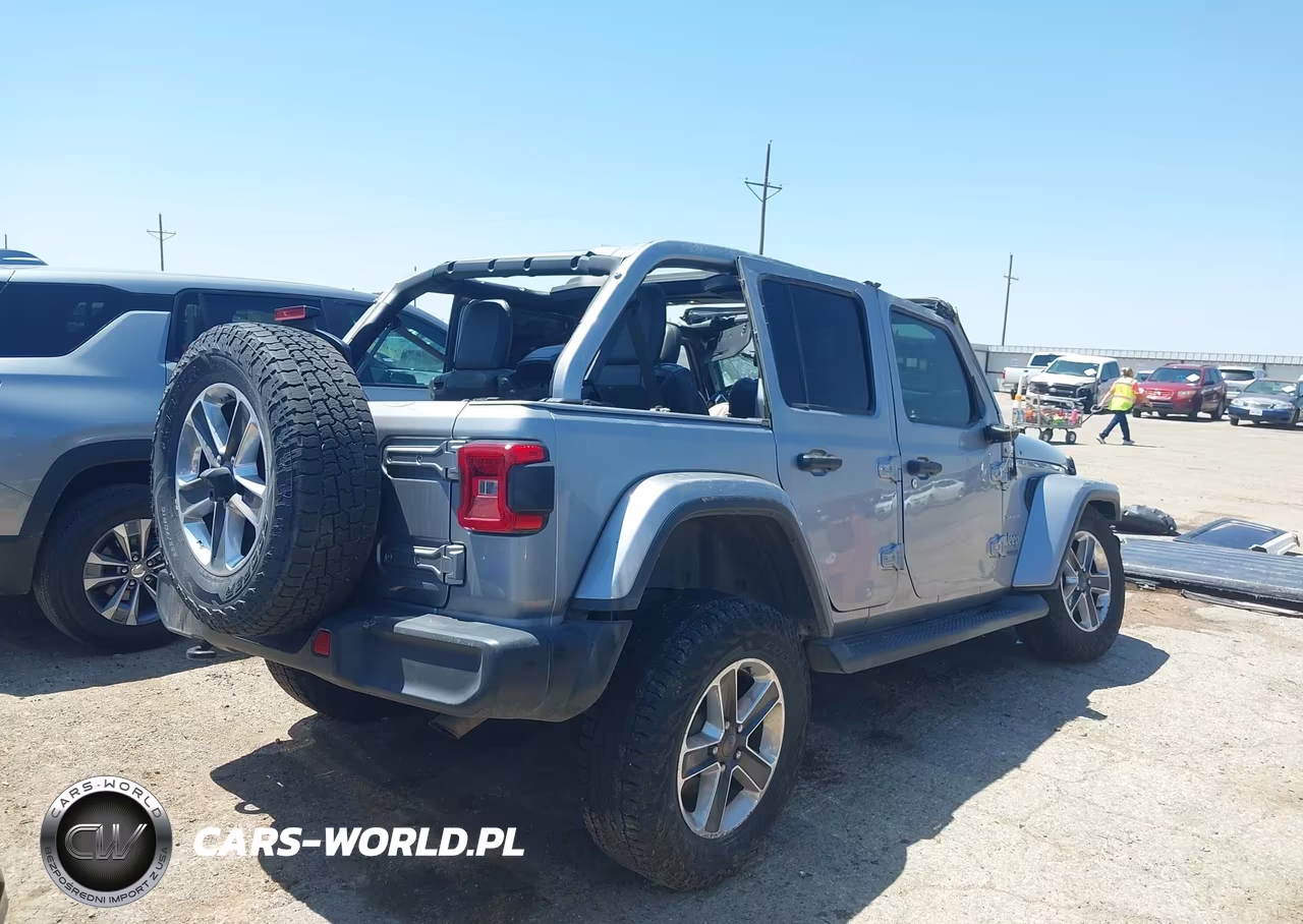 2019 Jeep Wrangler Unlimited Sahara 4X4 VIN:1C4HJXEN0KW690118 - 4