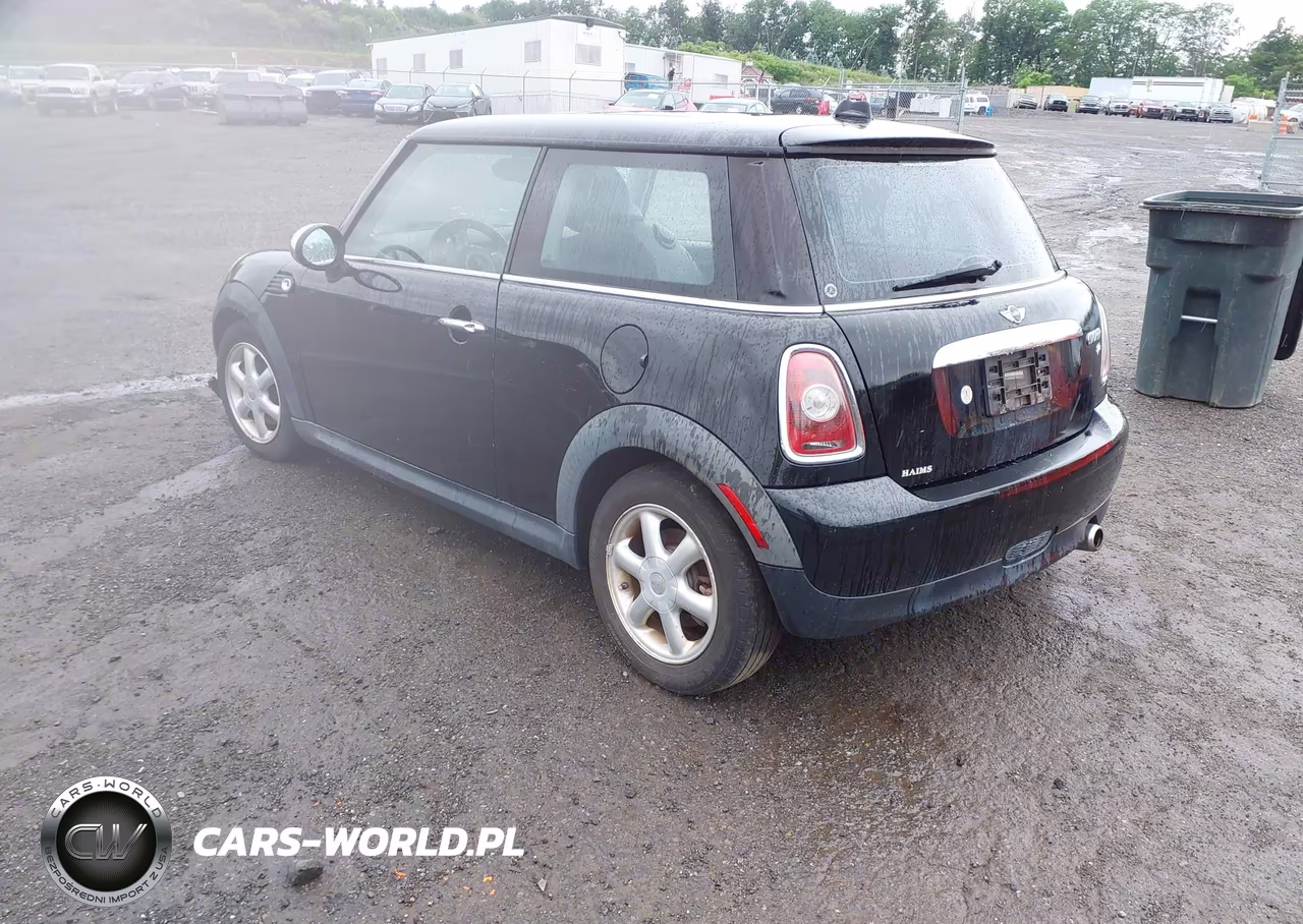 2009 Mini Cooper VIN:WMWMF33559TW73979 - 3