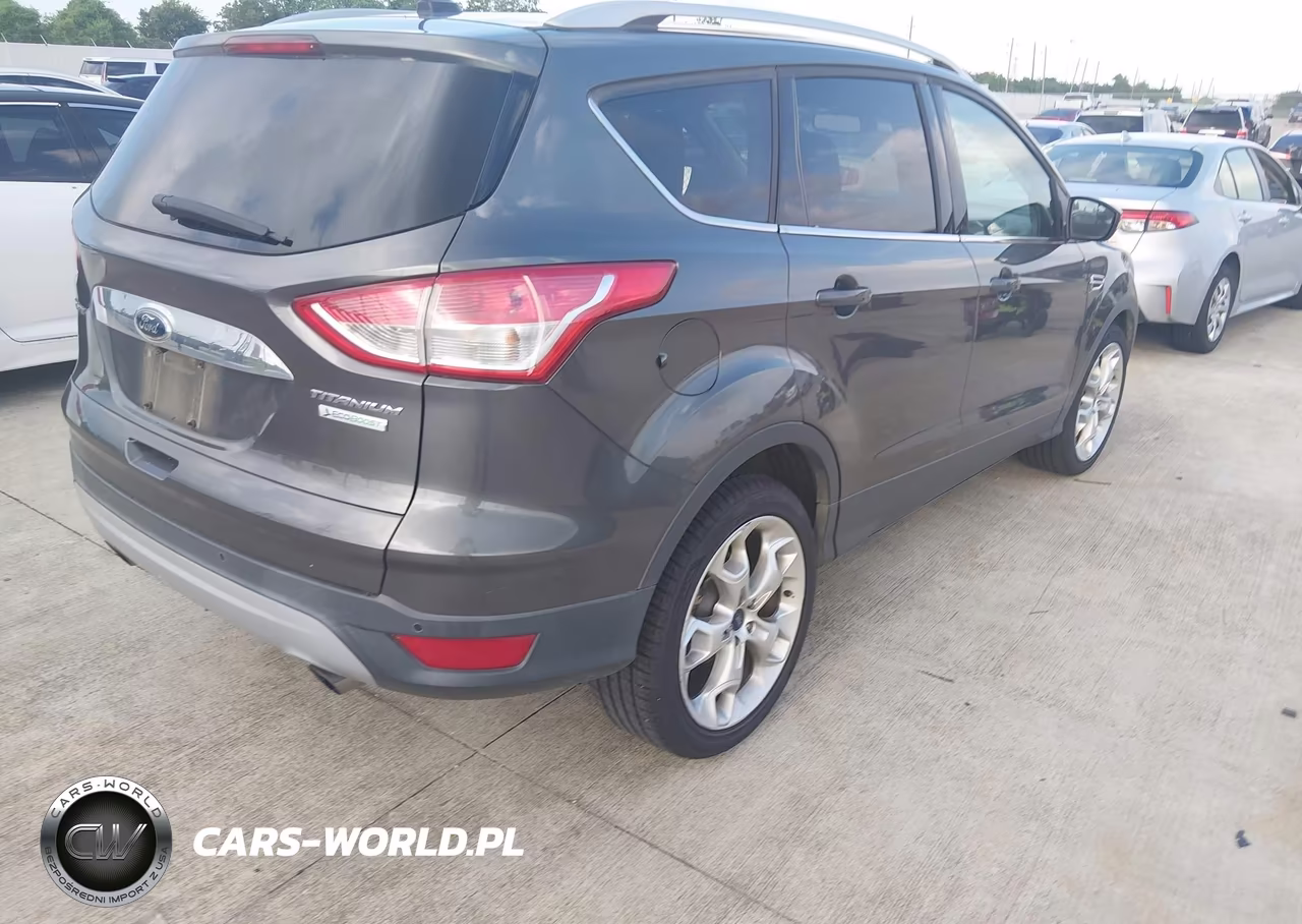 2015 Ford Escape Titanium VIN:1FMCU0J90FUC88131 - 4