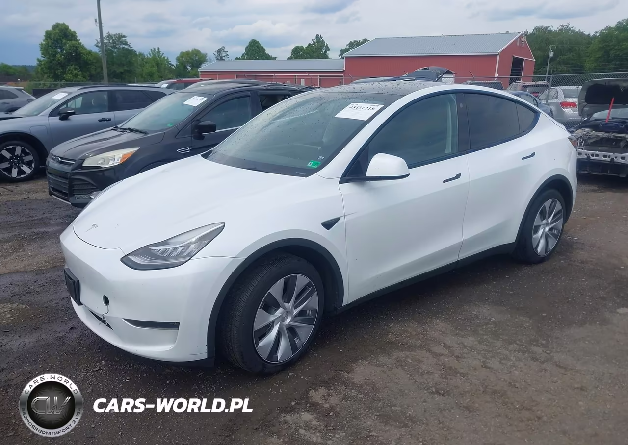 2023 Tesla Model Y Awd-Long Range Dual Motor All-Wheel Drive VIN:7SAYGDEE2PA073165 - 2