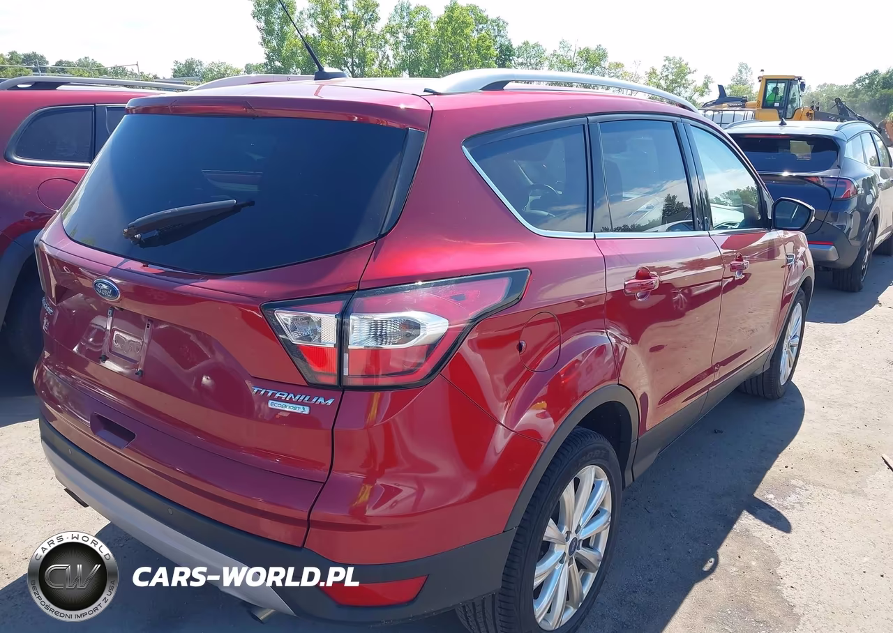 2017 Ford Escape Titanium VIN:1FMCU0JD2HUC64372 - 4