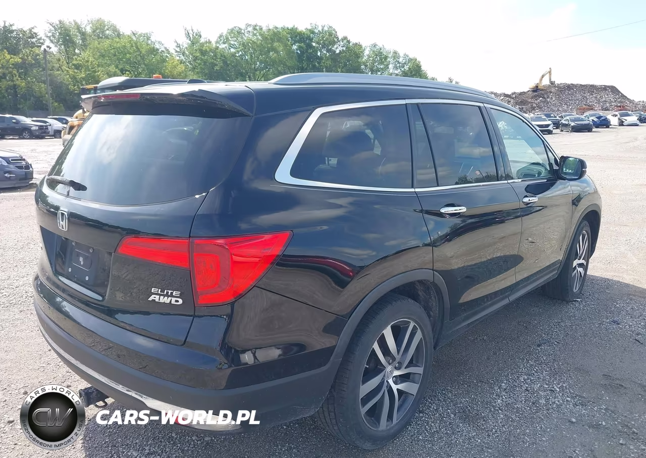 2016 Honda Pilot Elite VIN:5FNYF6H0XGB105424 - 4
