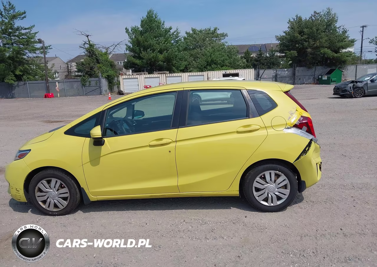 2015 Honda Fit Lx VIN:3HGGK5H57FM777157 - 14