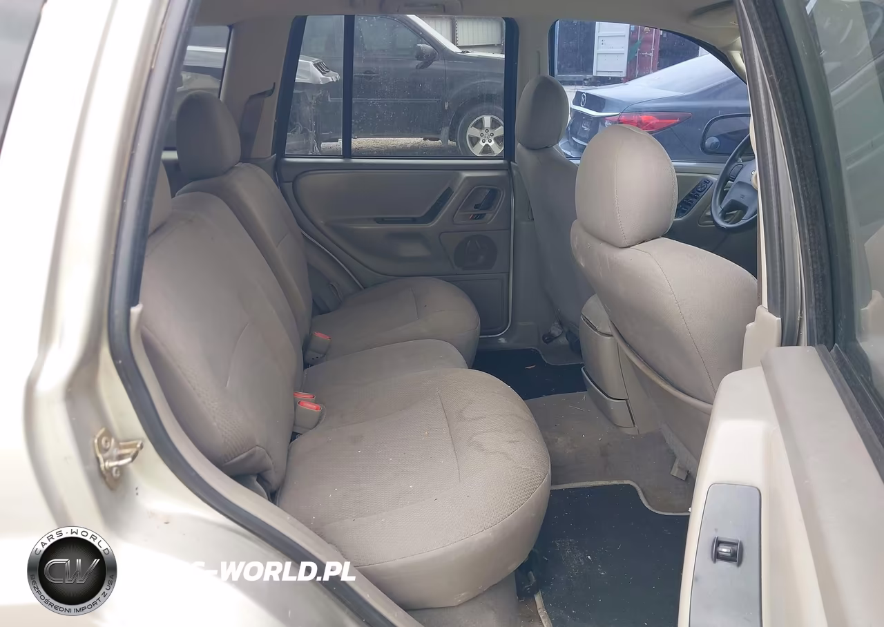2004 Jeep Grand Cherokee Laredo VIN:1J4GX48S34C241623 - 8