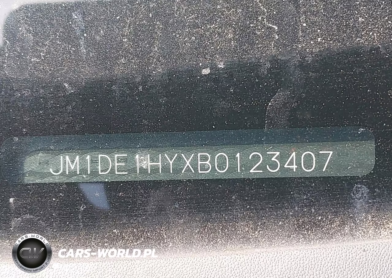 2011 Mazda Mazda2 Sport VIN:JM1DE1HYXB0123407 - 12