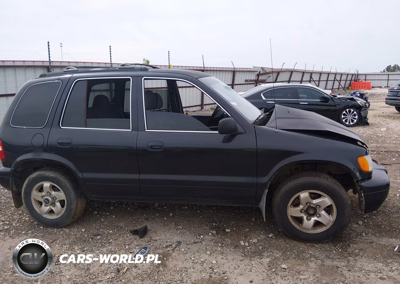 2002 Kia Sportage VIN:KNDJB723925146076 - 13