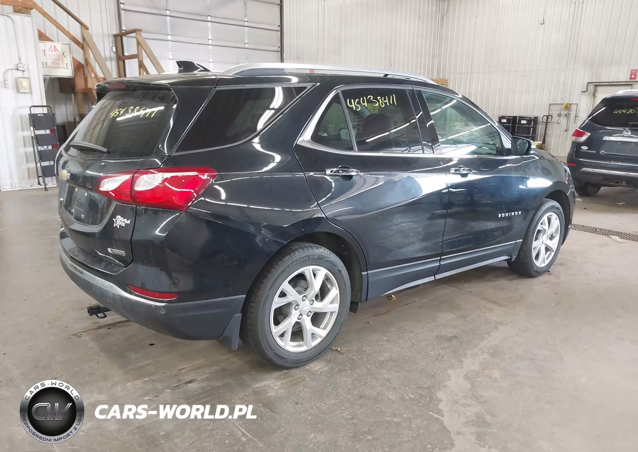 2018 Chevrolet Equinox Premier VIN:3GNAXMEV4JL131763 - 4