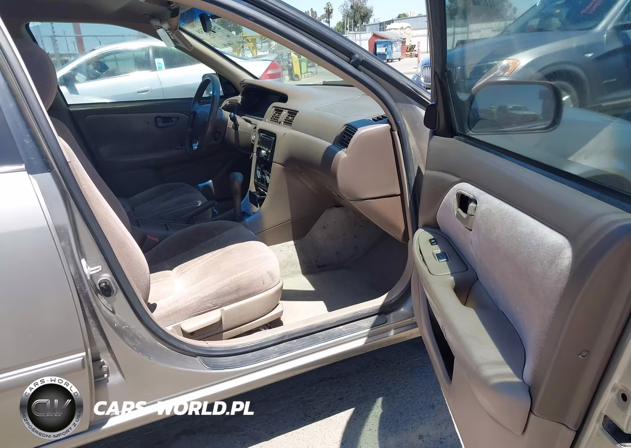 1999 Toyota Camry Le VIN:4T1BG22K1XU462418 - 5