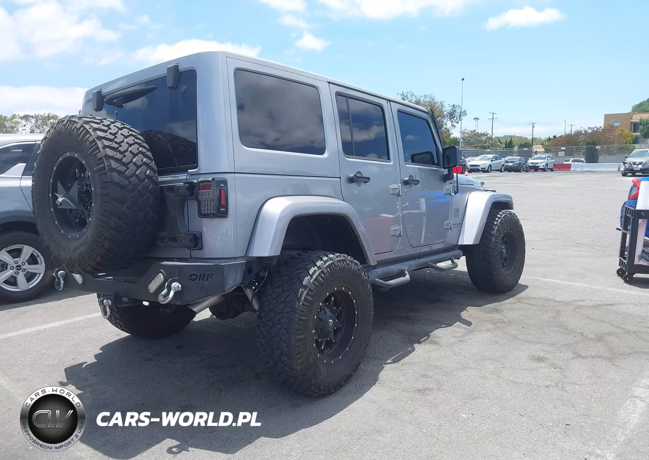 2014 Jeep Wrangler Unlimited Rubicon VIN:1C4BJWFG5EL120203 - 4