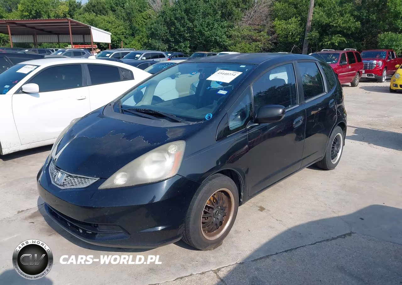 2009 Honda Fit VIN:JHMGE882X9S063613 - 2