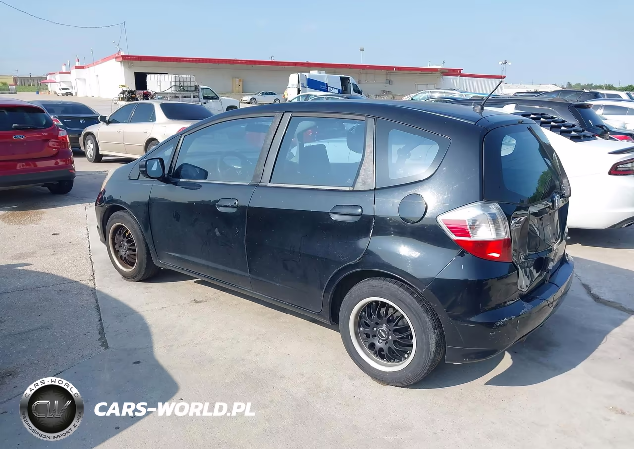 2009 Honda Fit VIN:JHMGE882X9S063613 - 3