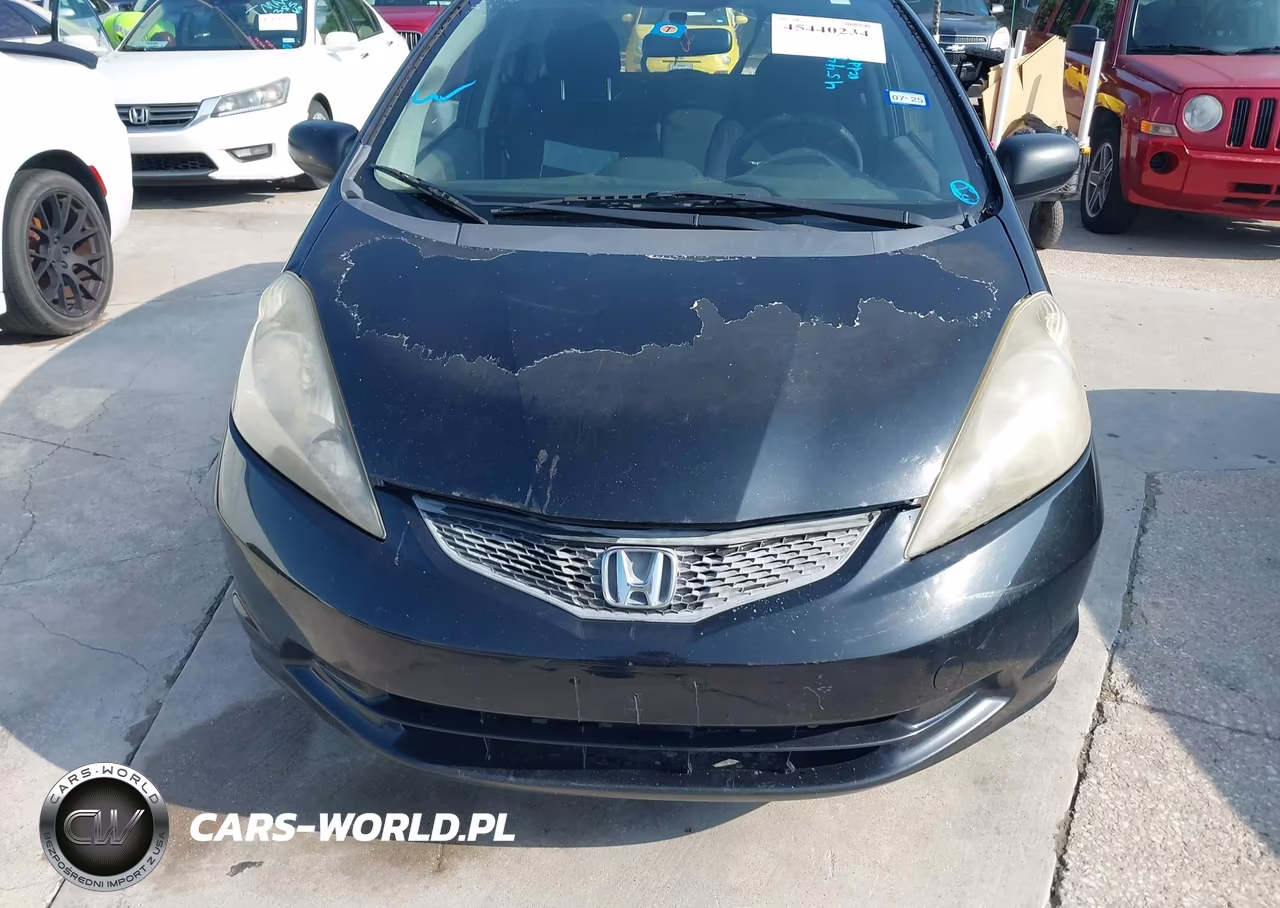 2009 Honda Fit VIN:JHMGE882X9S063613 - 6