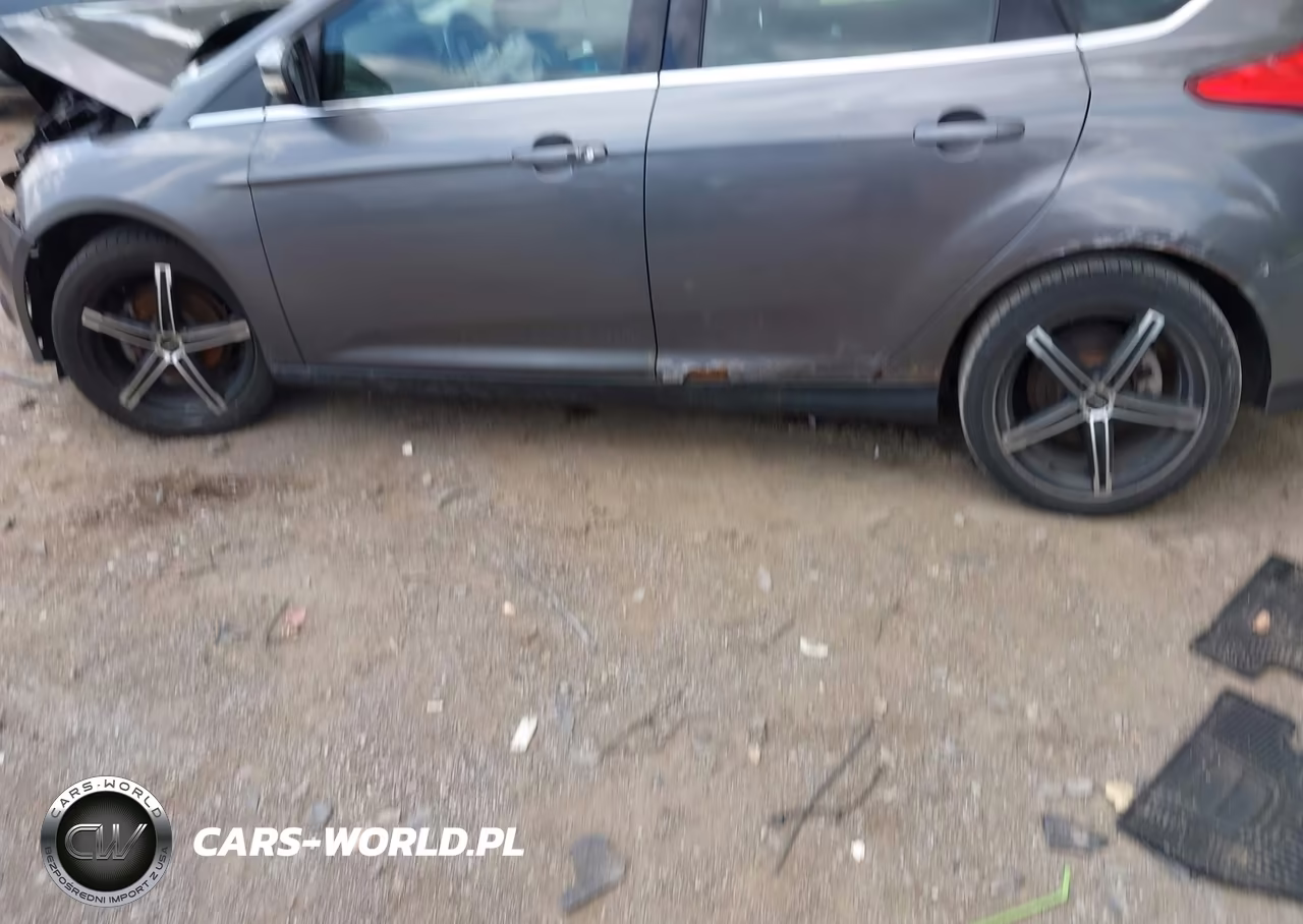 2012 Ford Focus Titanium VIN:1FAHP3N25CL385705 - 14
