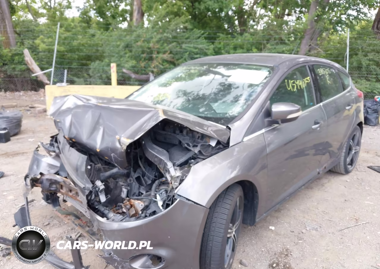 2012 Ford Focus Titanium VIN:1FAHP3N25CL385705 - 6