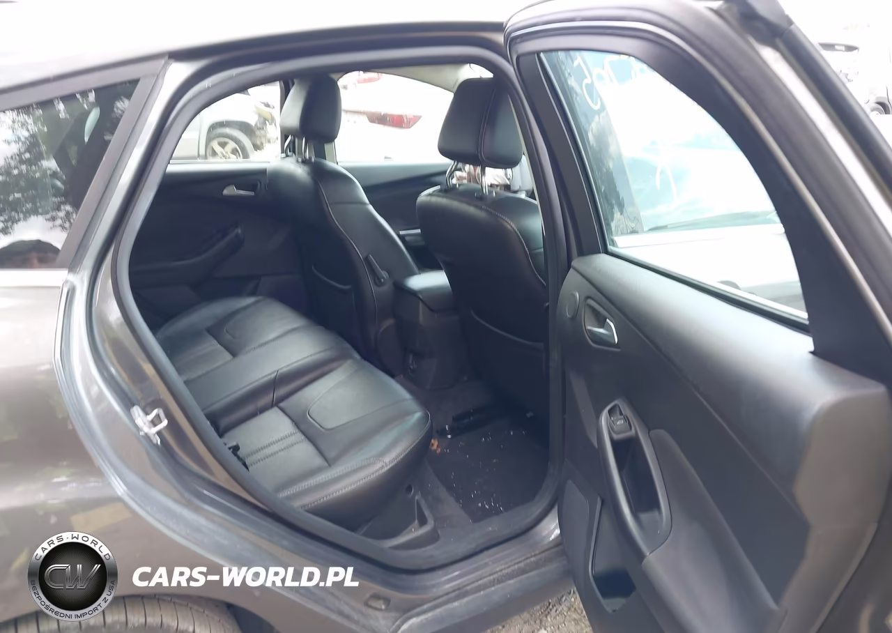 2012 Ford Focus Titanium VIN:1FAHP3N25CL385705 - 8