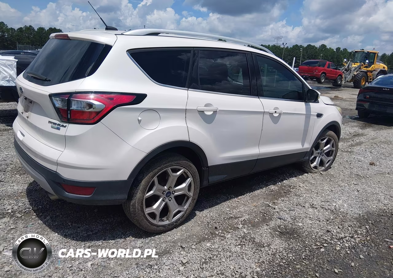 2017 Ford Escape Titanium VIN:1FMCU9J95HUD07845 - 4