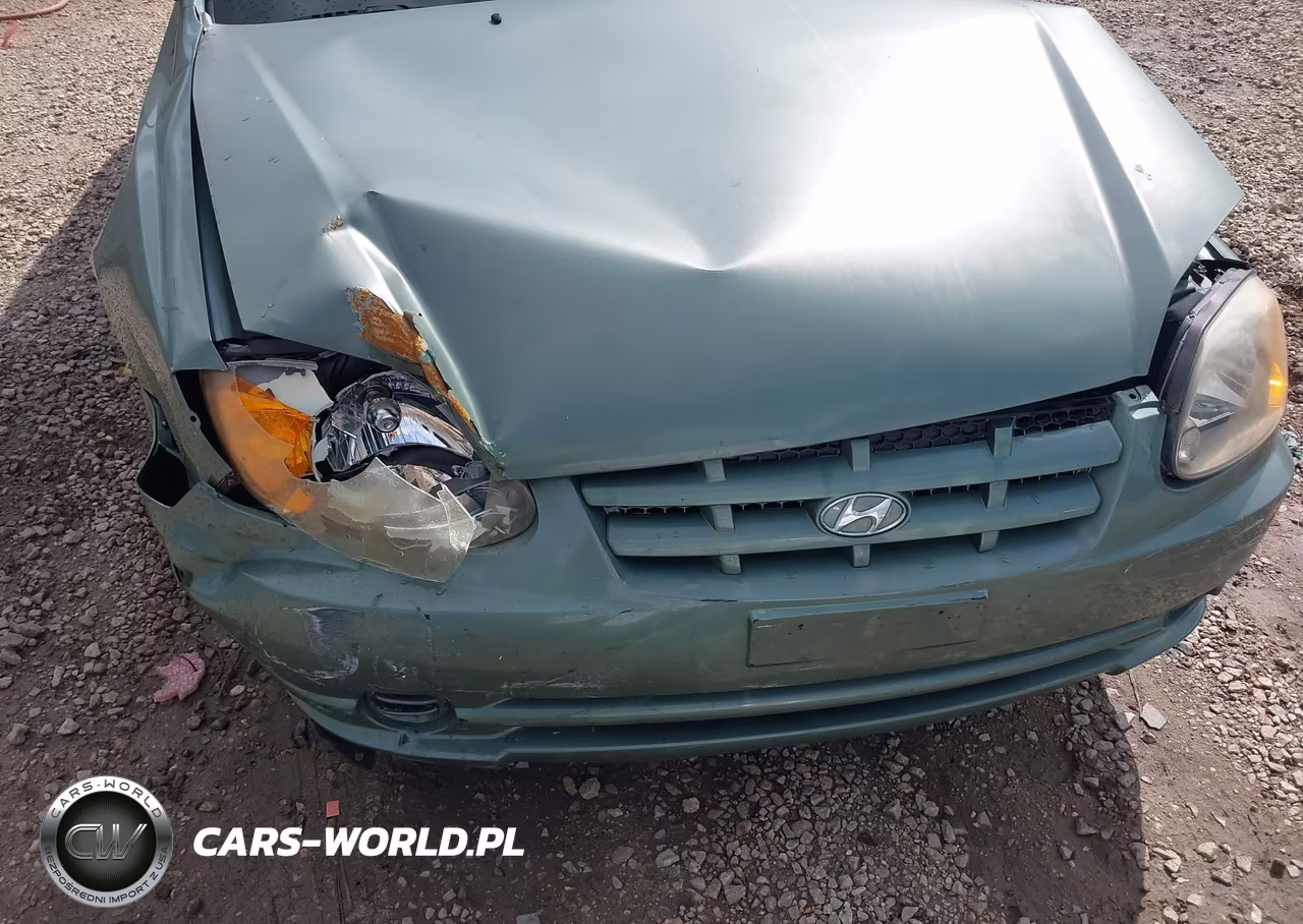 2005 Hyundai Accent Gls VIN:KMHCG45C35U595666 - 13
