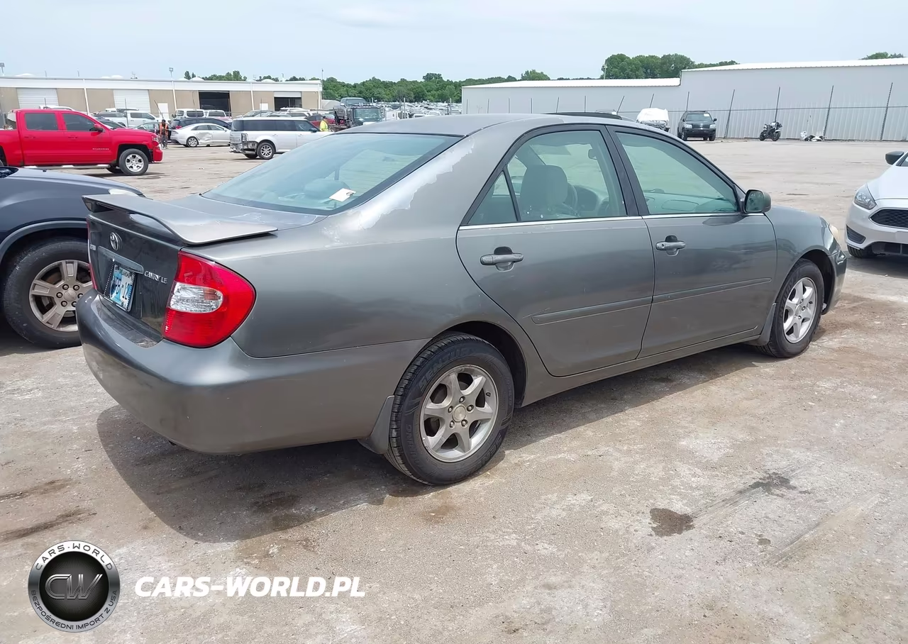 2002 Toyota Camry Le VIN:4T1BE32K12U609454 - 4