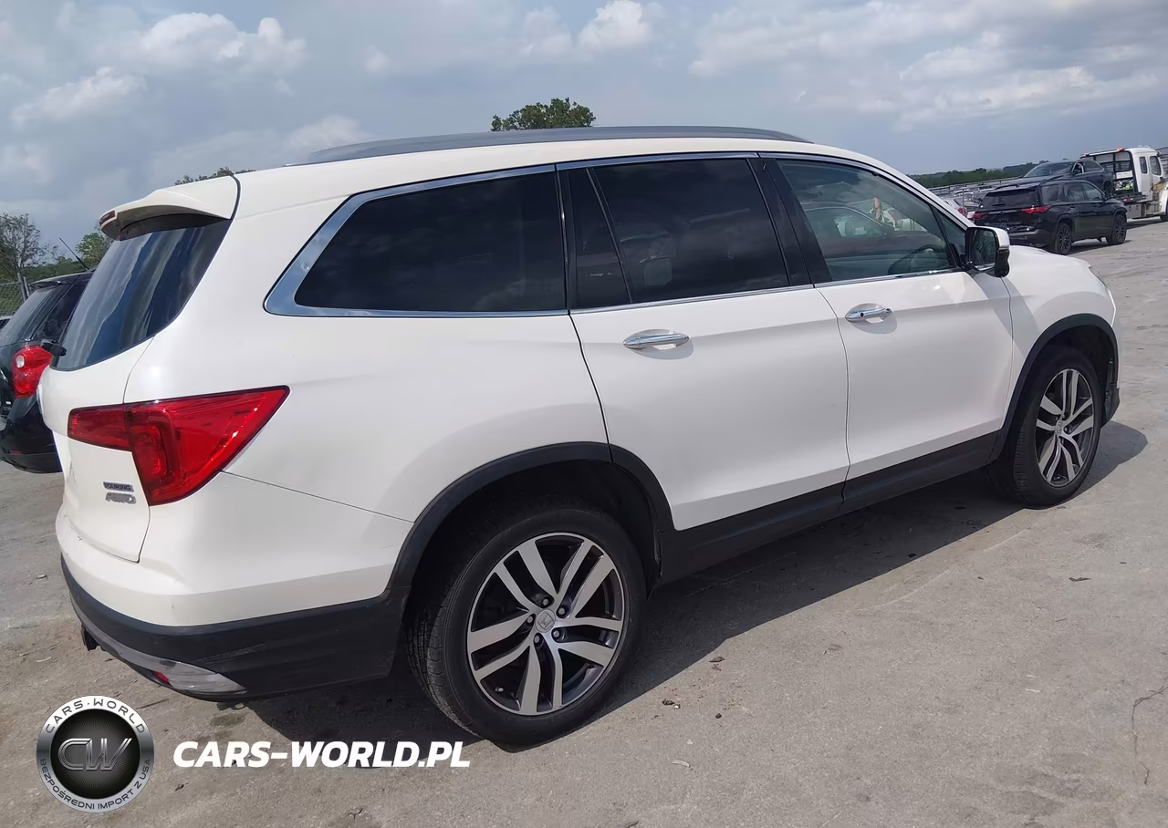 2017 Honda Pilot Touring VIN:5FNYF6H97HB002235 - 4