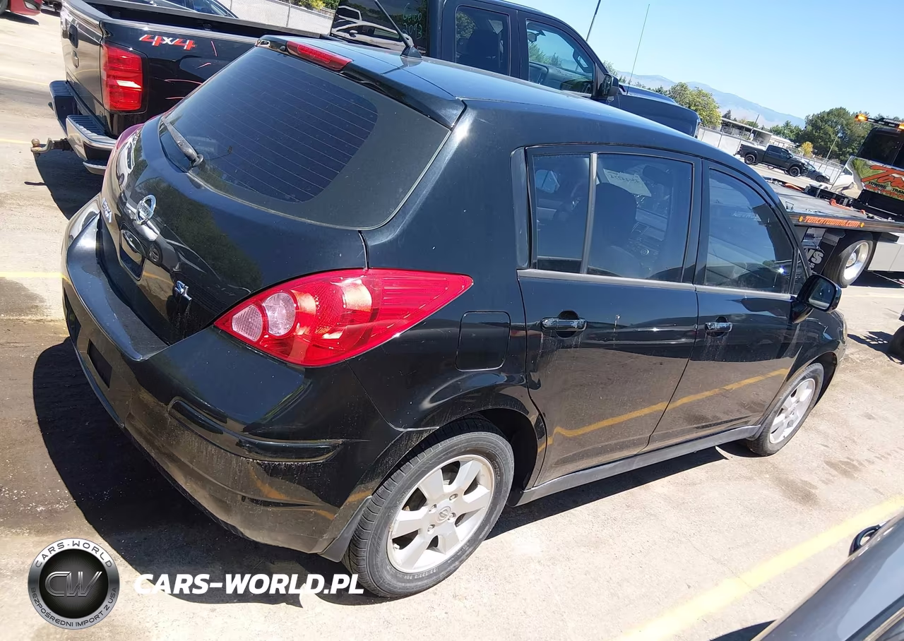 2009 Nissan Versa 1.8Sl VIN:3N1BC13E09L423421 - 4