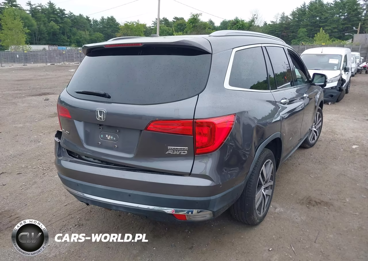 2017 Honda Pilot Touring VIN:5FNYF6H91HB033111 - 4