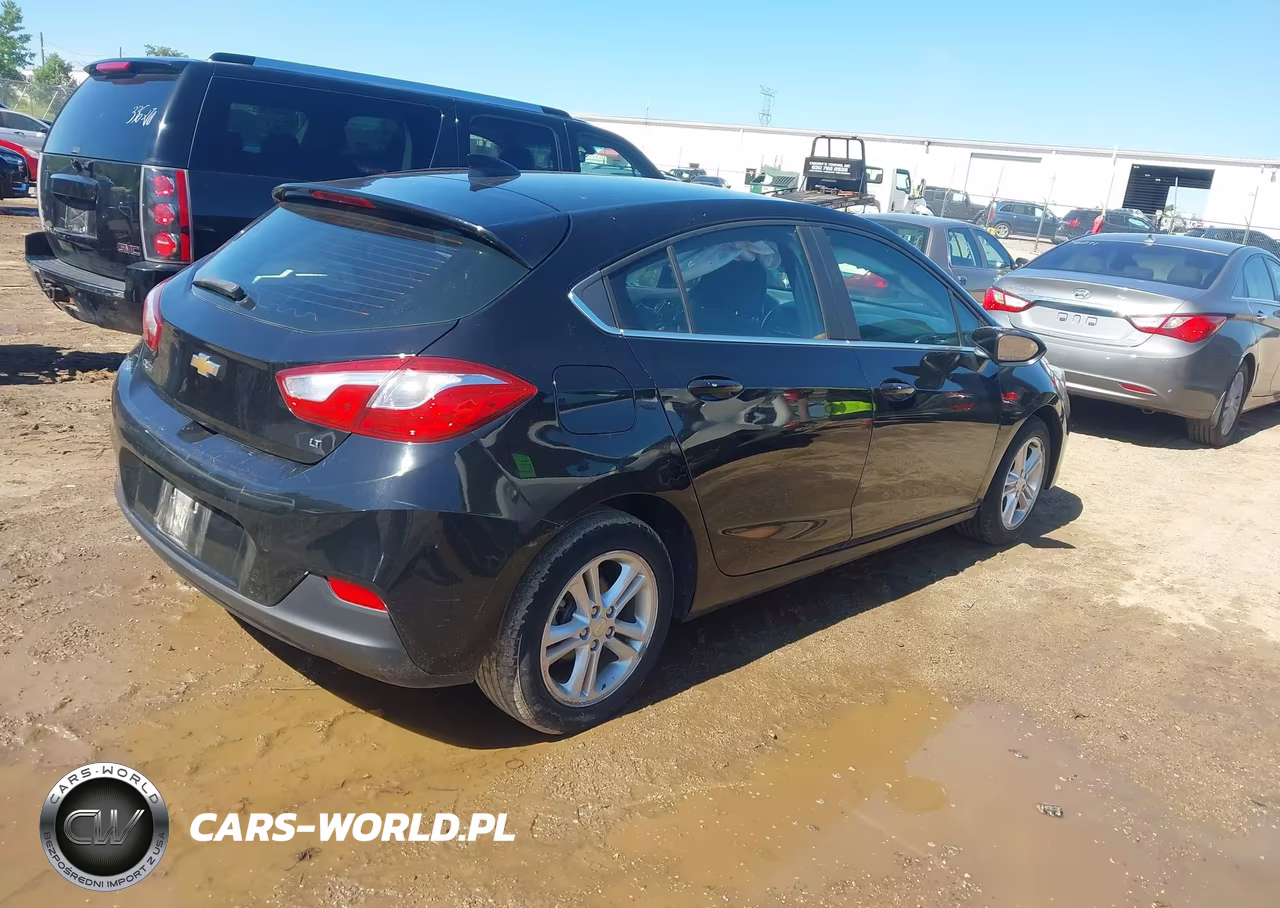 2018 Chevrolet Cruze Lt Auto VIN:3G1BE6SMXJS630611 - 4