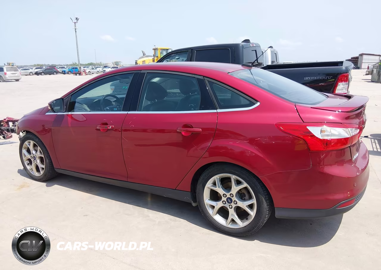 2014 Ford Focus Titanium VIN:1FADP3J23EL128033 - 15