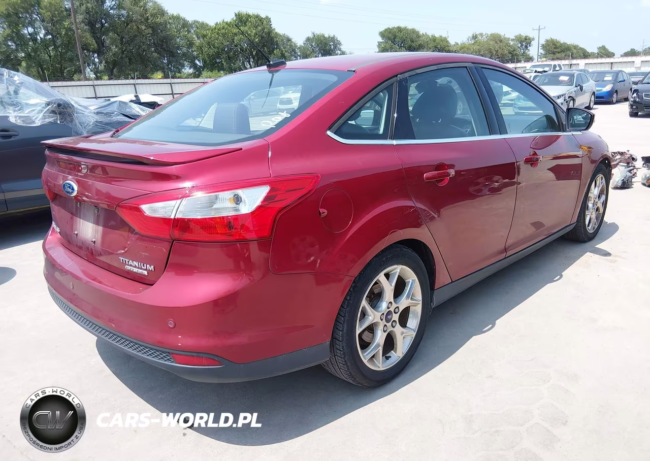 2014 Ford Focus Titanium VIN:1FADP3J23EL128033 - 4