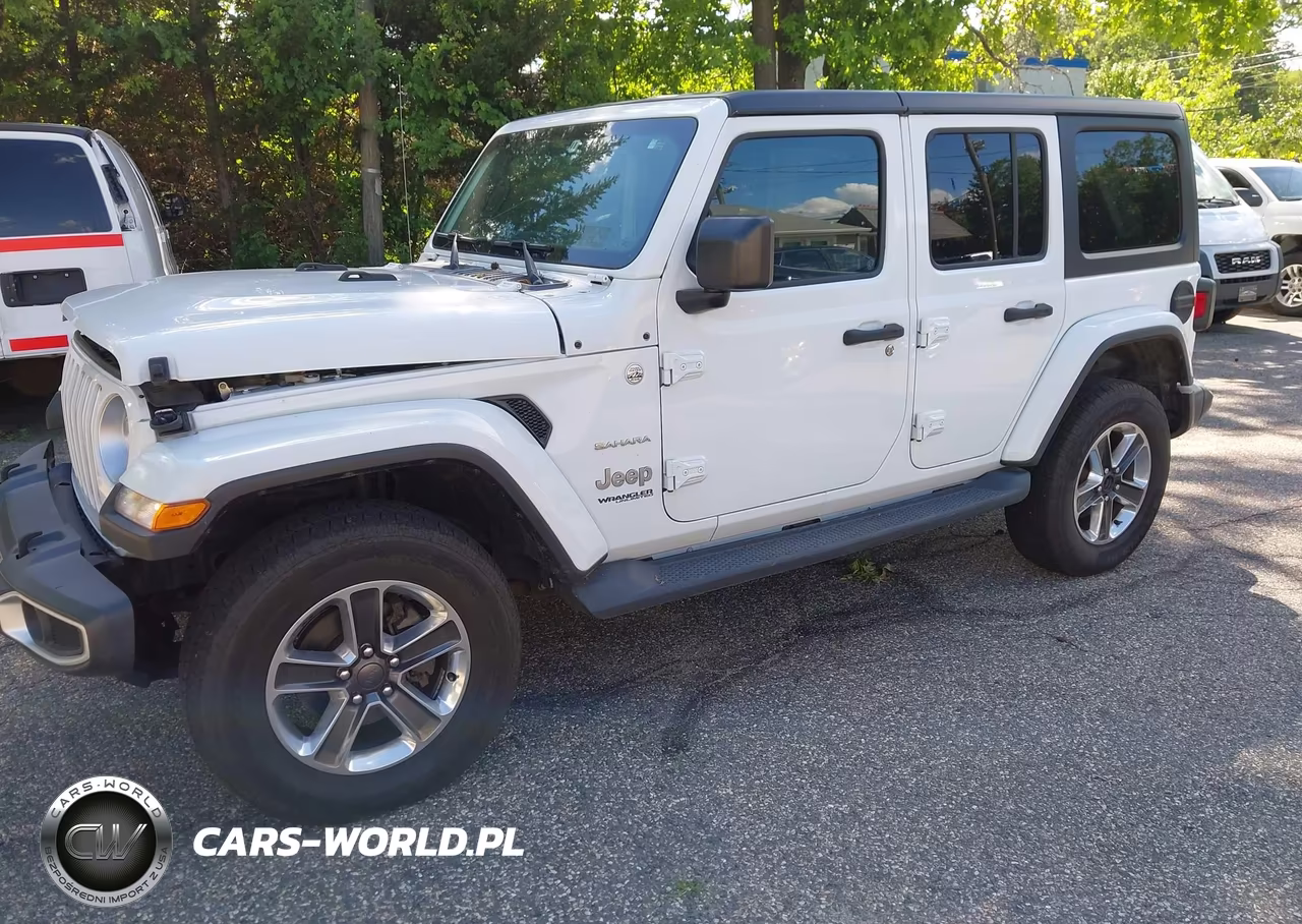 2019 Jeep Wrangler Unlimited Sahara 4X4 VIN:1C4HJXEN0KW590312 - 2