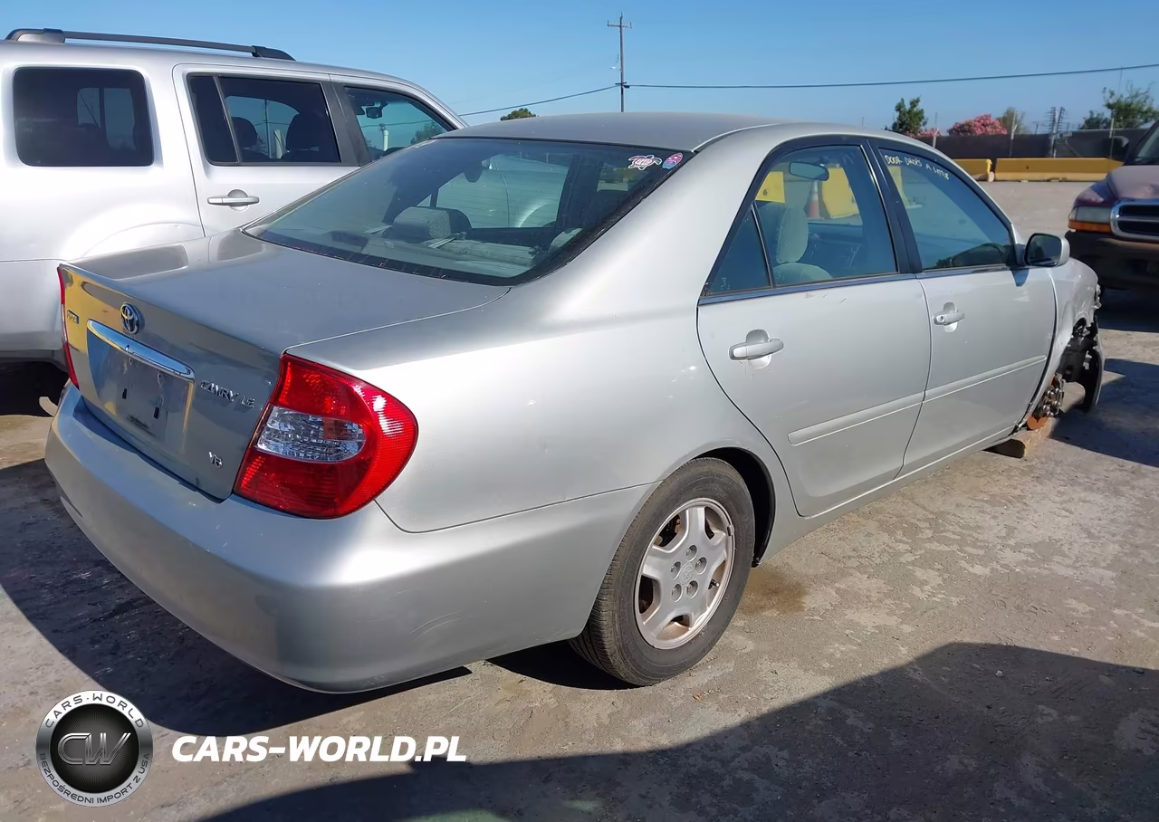 2002 Toyota Camry Le VIN:4T1BF30K92U022709 - 4