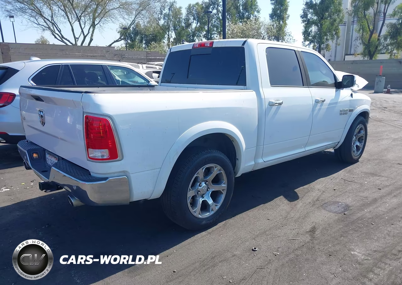 2015 Ram 1500 Laramie VIN:1C6RR6NT6FS591524 - 4