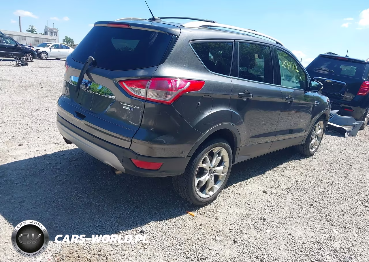 2015 Ford Escape Titanium VIN:1FMCU9JX8FUC23949 - 4