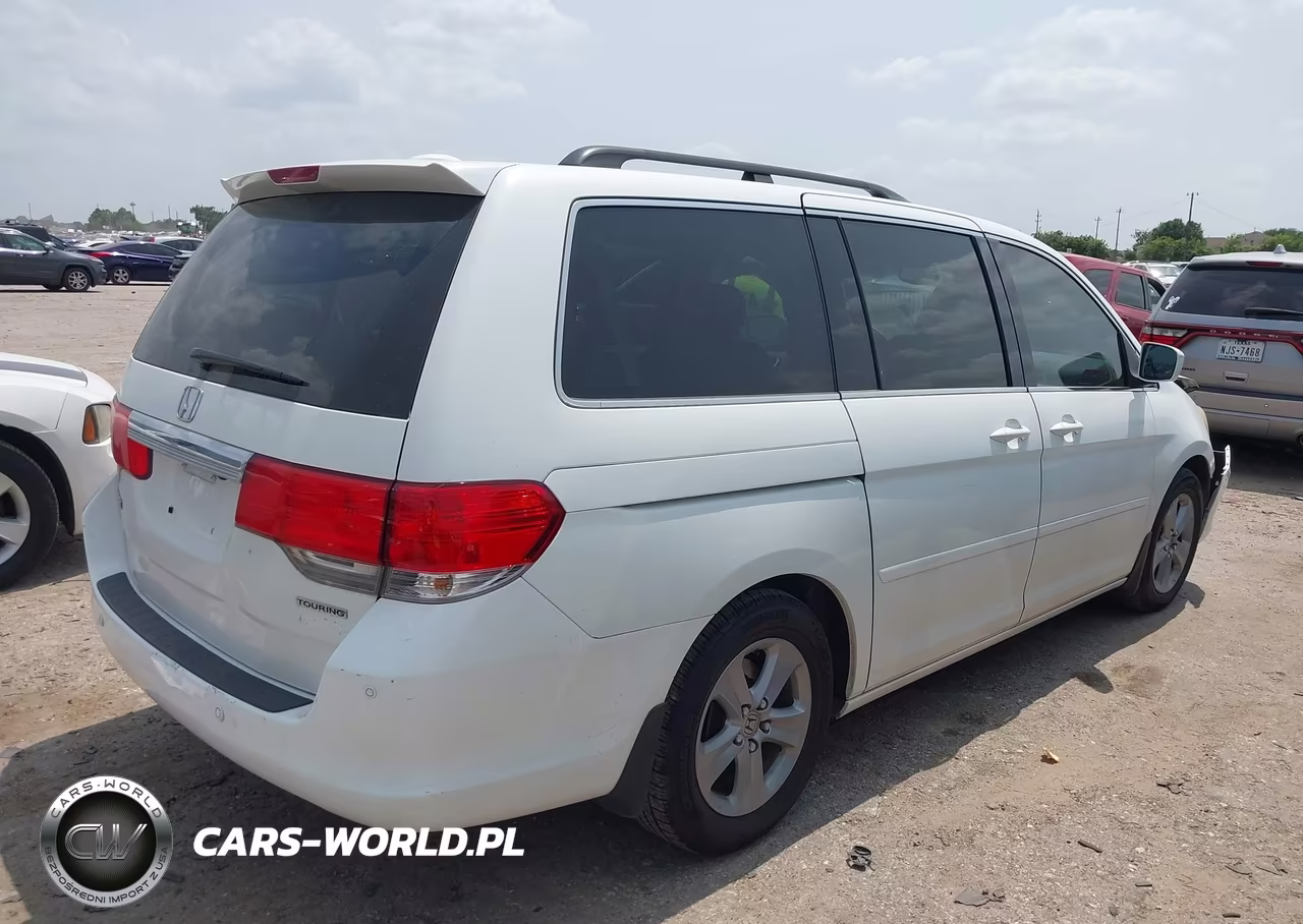 2010 Honda Odyssey Touring VIN:5FNRL3H90AB022005 - 13