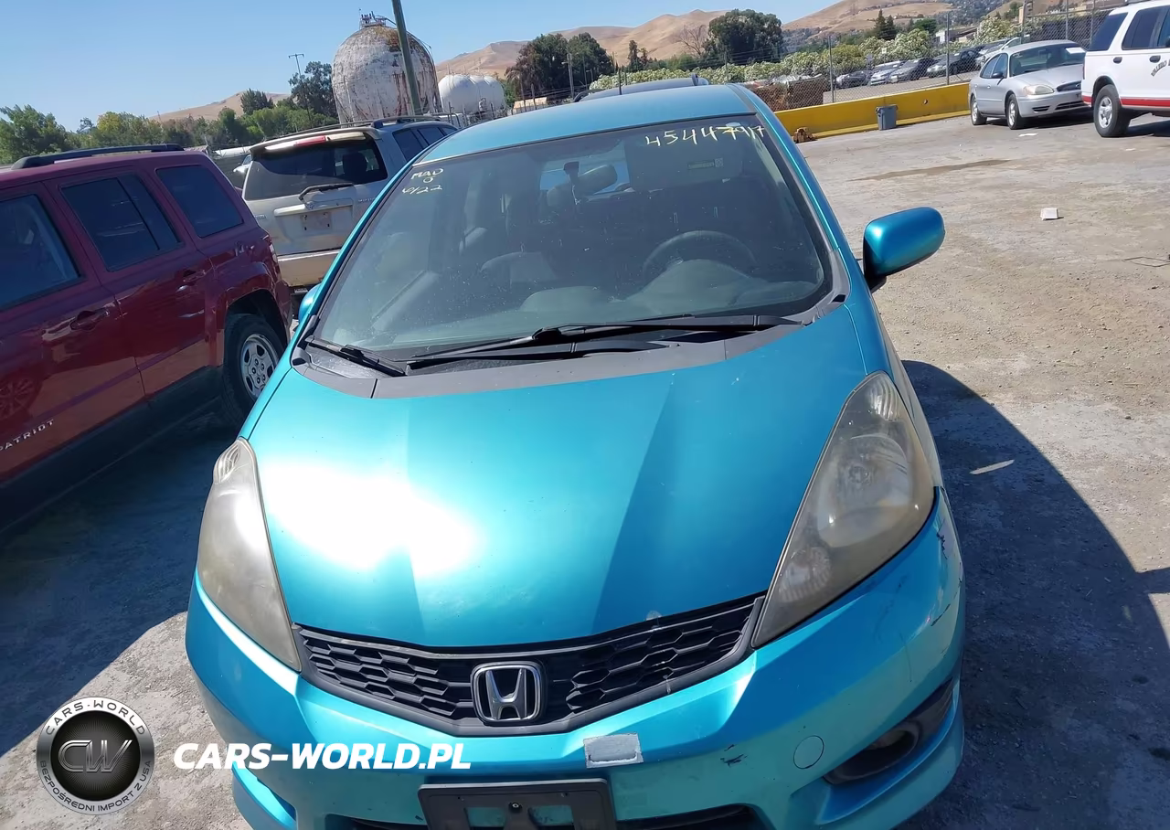 2013 Honda Fit Sport VIN:JHMGE8H56DC050578 - 12