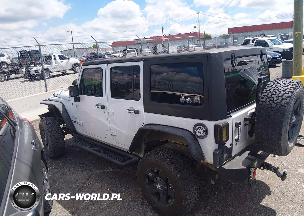 2012 Jeep Wrangler Unlimited Sahara VIN:1C4BJWEG1CL108354 - 14