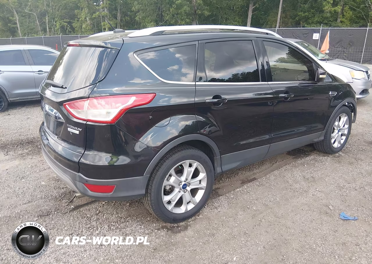 2015 Ford Escape Titanium VIN:1FMCU0J94FUB29094 - 4