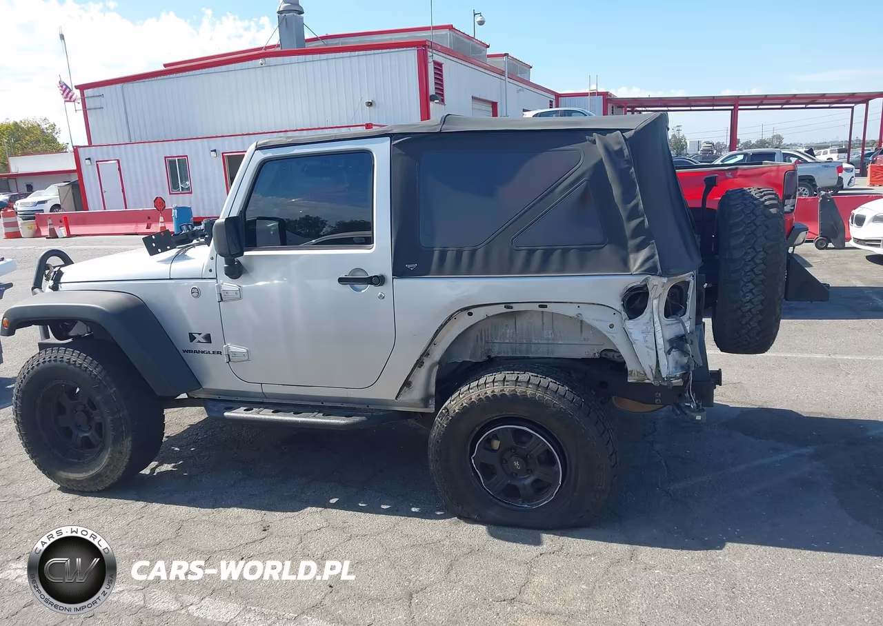 2009 Jeep Wrangler X VIN:1J4FA24119L790663 - 14