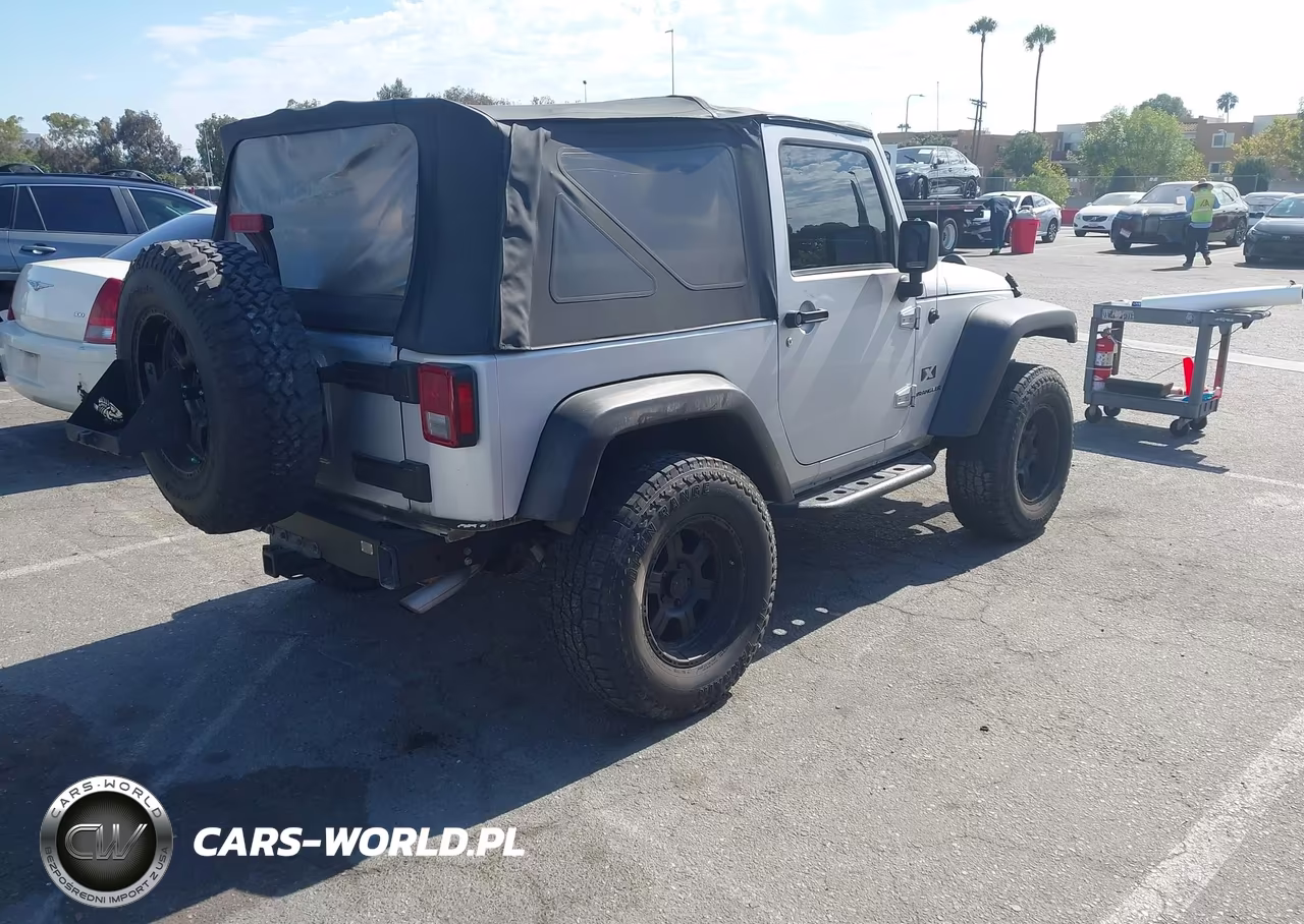 2009 Jeep Wrangler X VIN:1J4FA24119L790663 - 4