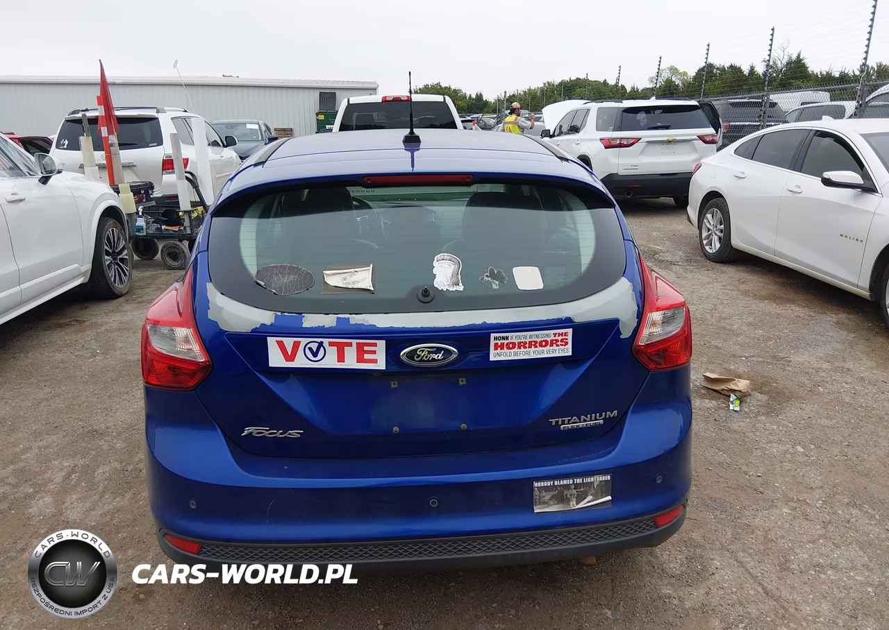 2013 Ford Focus Titanium VIN:1FADP3N29DL131642 - 16