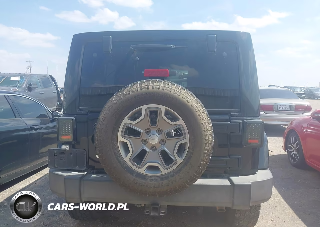 2014 Jeep Wrangler Unlimited Rubicon VIN:1C4BJWFG4EL182904 - 16