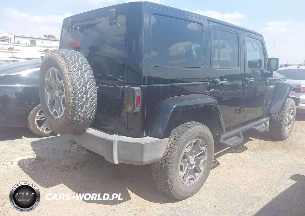 2014 Jeep Wrangler Unlimited Rubicon VIN:1C4BJWFG4EL182904 - 4
