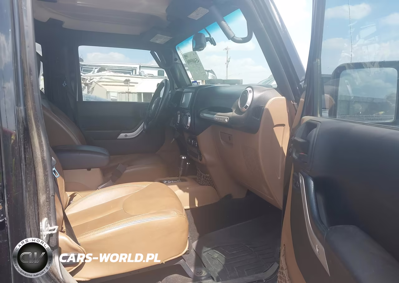 2014 Jeep Wrangler Unlimited Rubicon VIN:1C4BJWFG4EL182904 - 5