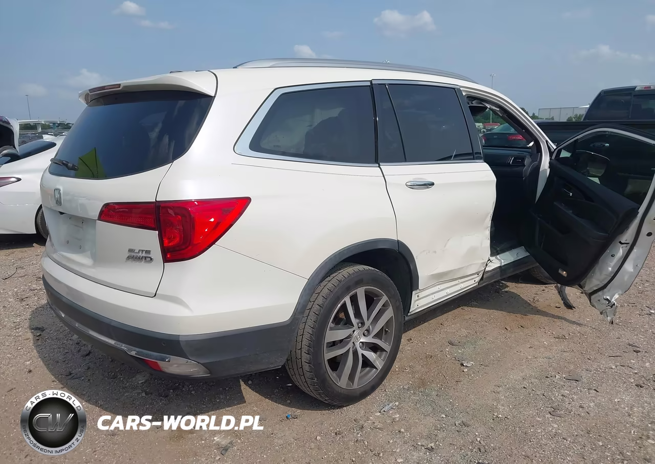 2018 Honda Pilot Elite VIN:5FNYF6H01JB035769 - 4
