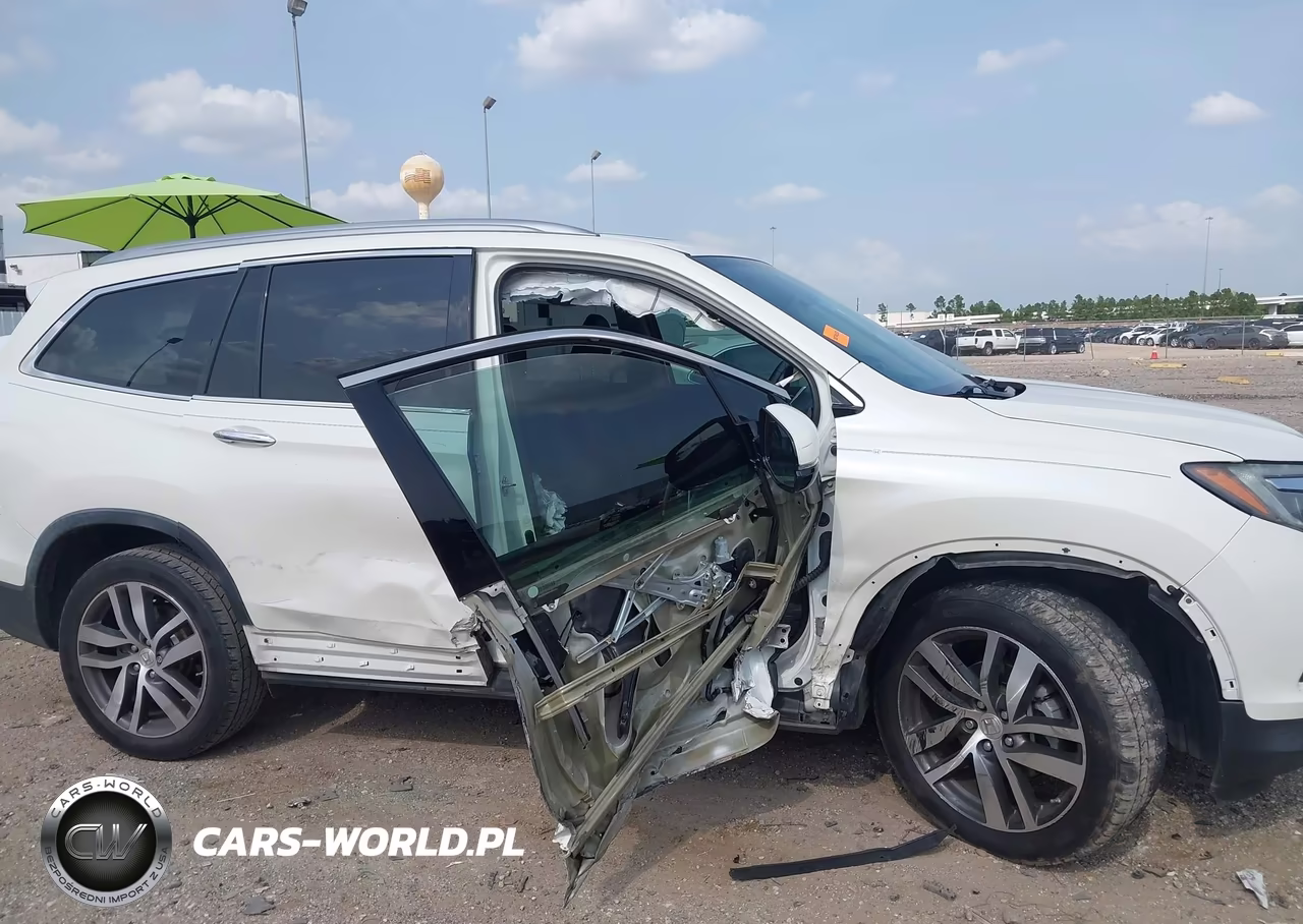 2018 Honda Pilot Elite VIN:5FNYF6H01JB035769 - 6