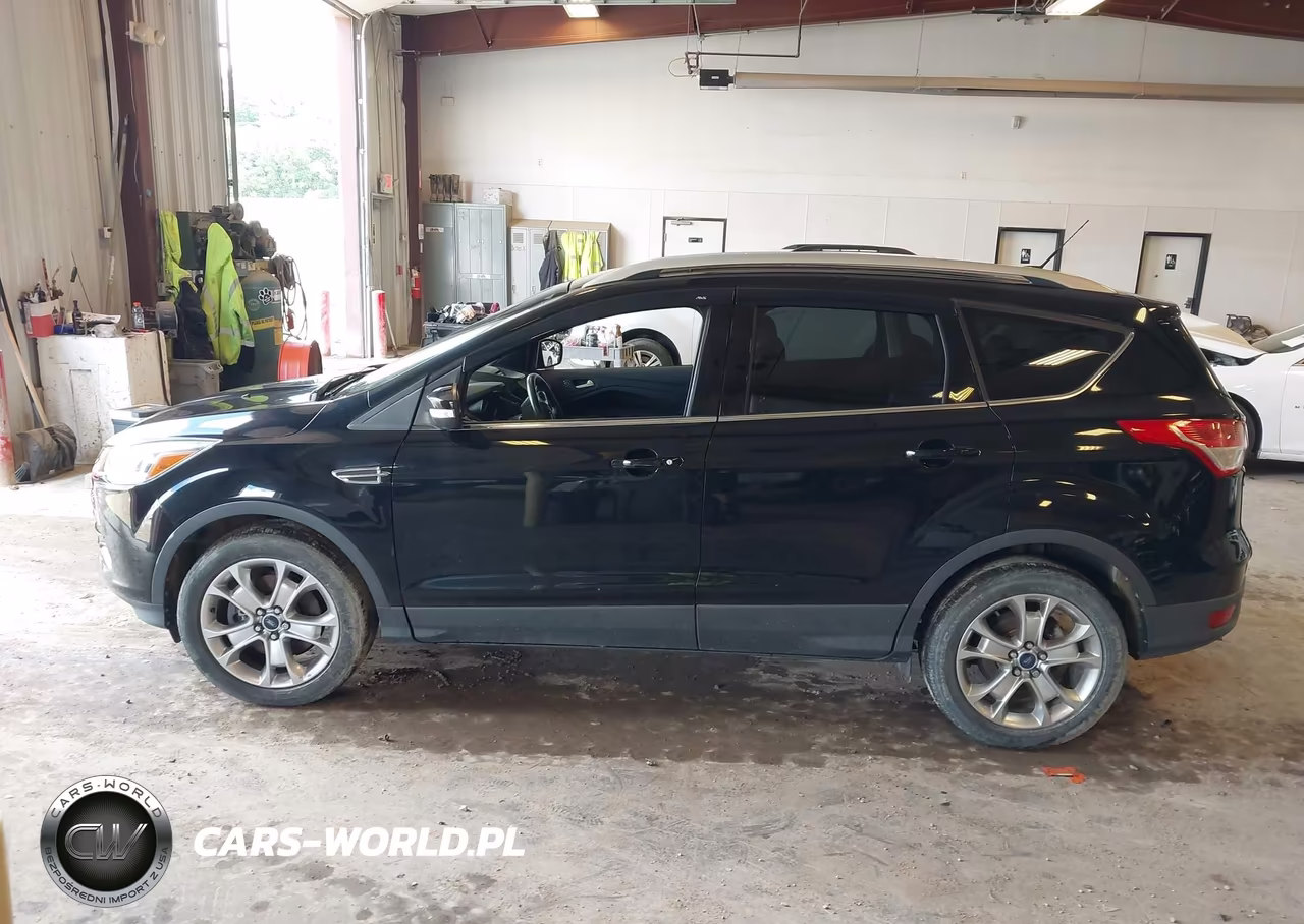 2016 Ford Escape Titanium VIN:1FMCU9JX8GUA28225 - 14
