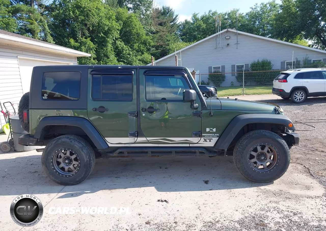 2009 Jeep Wrangler Unlimited X VIN:1J4GA39149L711196 - 13